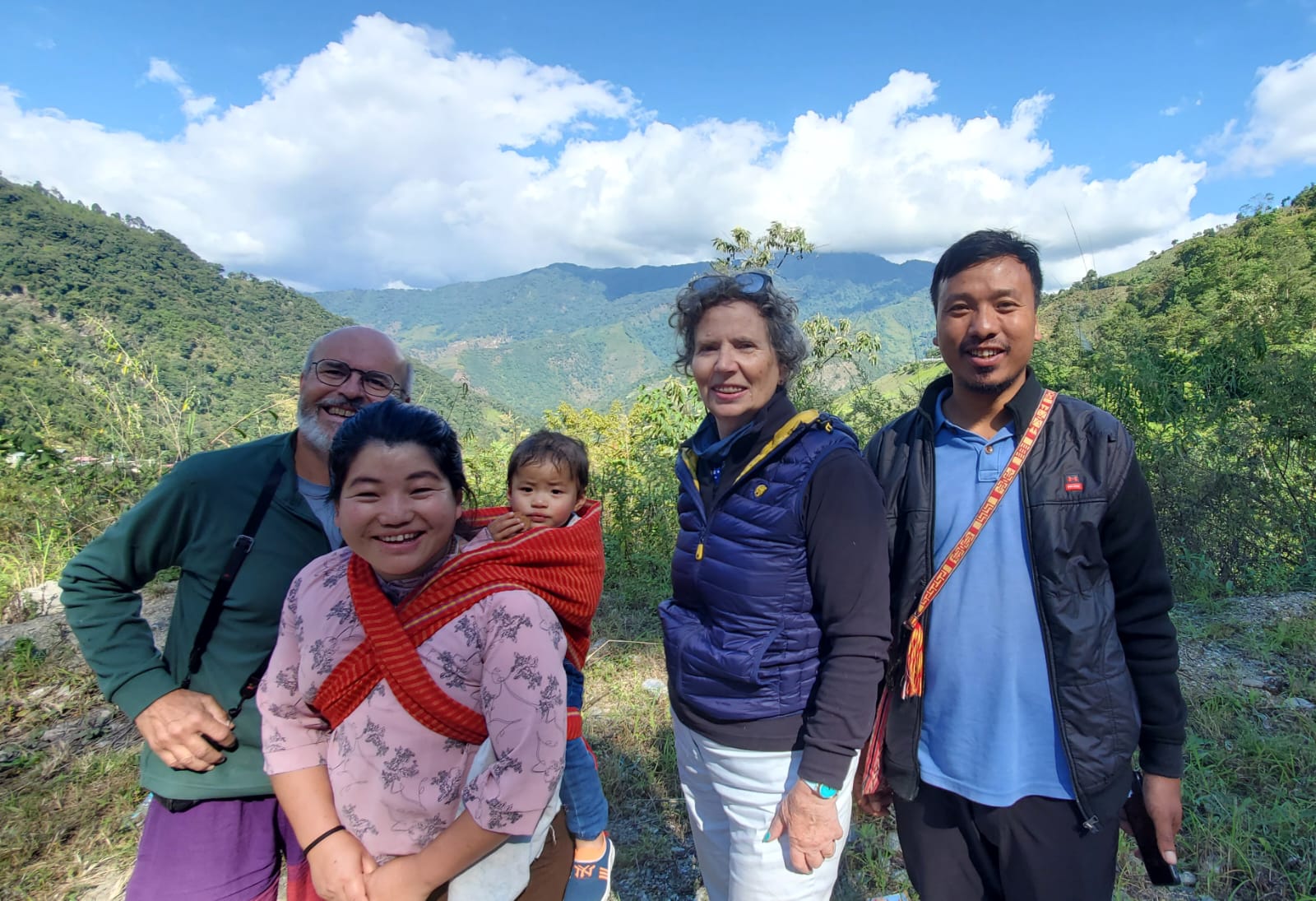 Robert and Odile with a local family in the mountains of Arunachal Pradesh during their journey to the Hornbill Festival