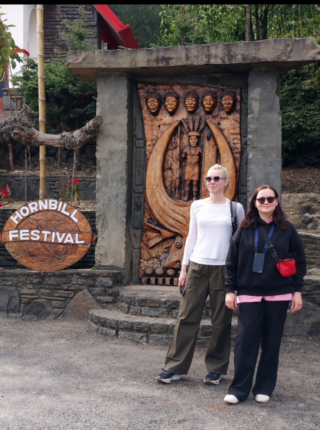 Natalia Dmitrieva and her travel companion at the Hornbill Festival gate in Kisama Heritage Village, Nagaland