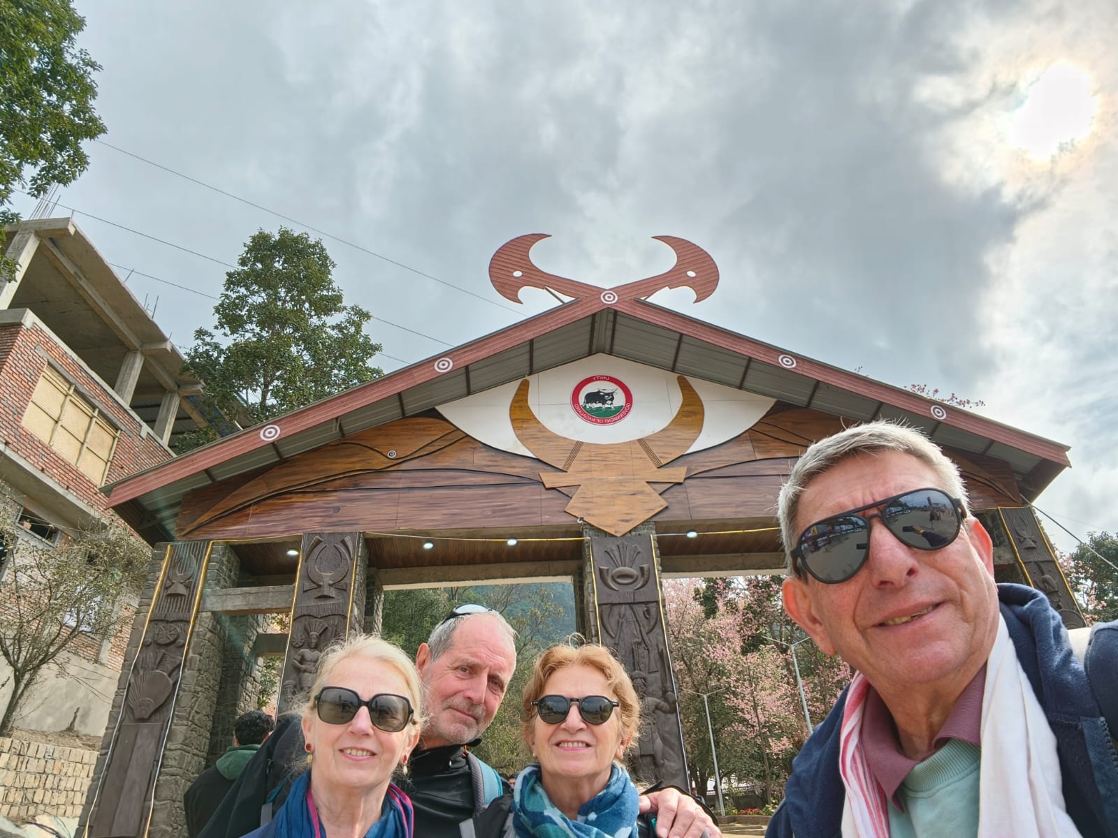 Thierry from France at the entrance of Kisama Heritage Village during the Hornbill Festival in Nagaland